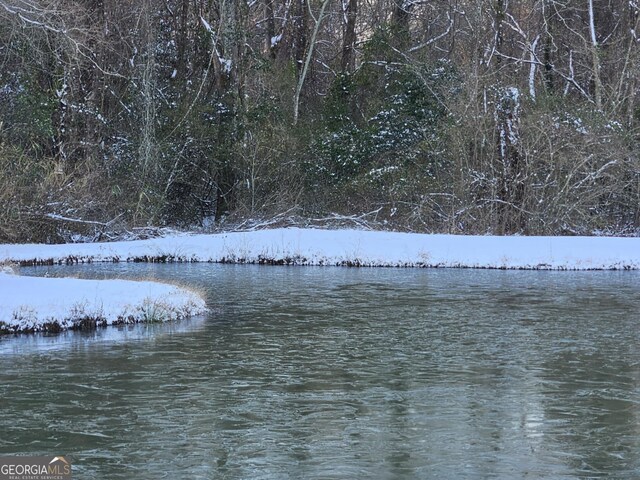 view of yard layered in snow