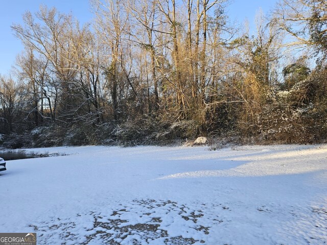 view of snow covered land