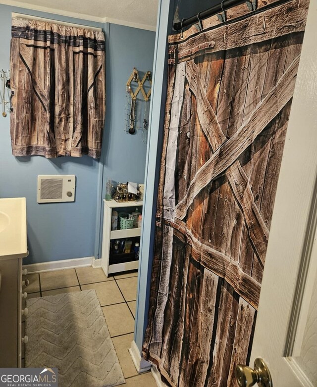 bathroom with vanity and tile patterned floors