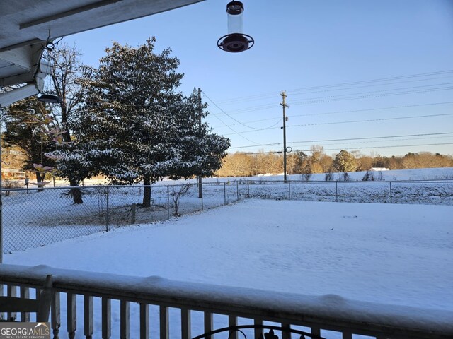 view of snowy yard