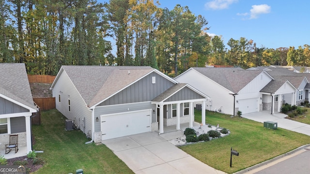 view of front of house with a porch, central AC, and a front lawn