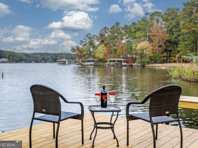 view of dock with a water view