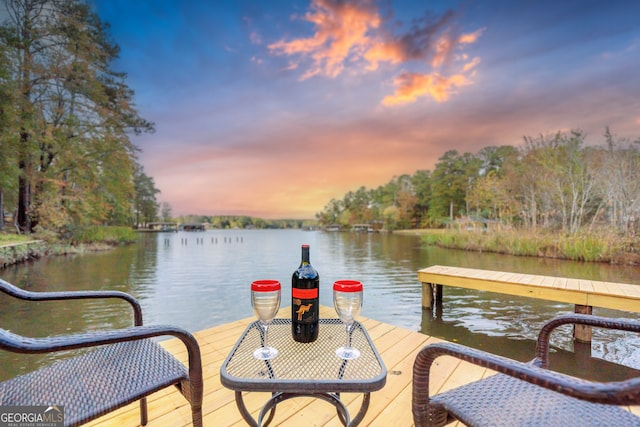 view of dock with a water view