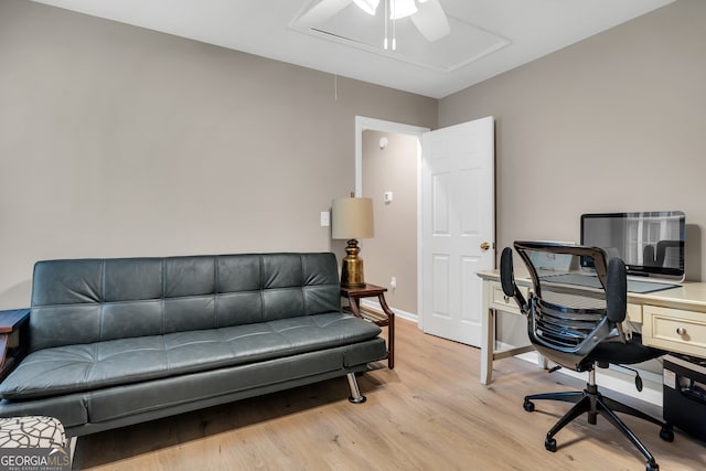 office area with light hardwood / wood-style floors