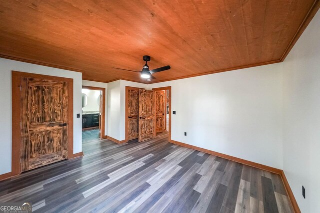 kitchen featuring light stone countertops, stainless steel appliances, wall chimney range hood, hardwood / wood-style floors, and decorative backsplash