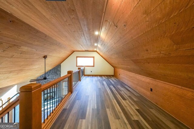 bathroom with tile patterned floors, crown molding, a washtub, and wood ceiling