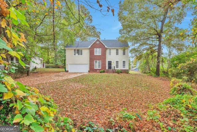 colonial house featuring a garage