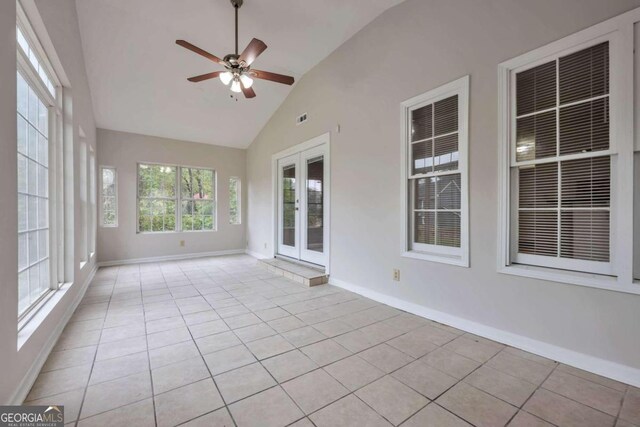 unfurnished sunroom featuring vaulted ceiling and ceiling fan