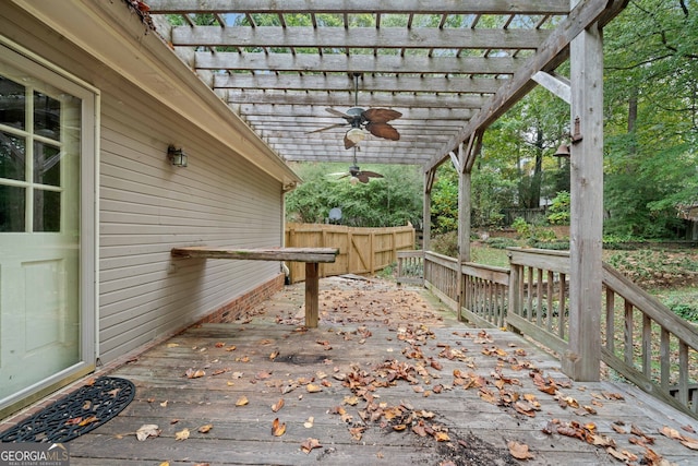 wooden terrace with a pergola and ceiling fan