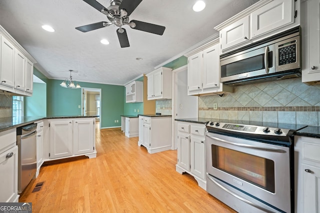 kitchen featuring white cabinets and stainless steel appliances