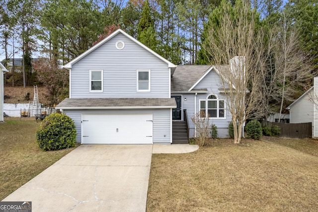 view of front facade featuring a front yard and a garage