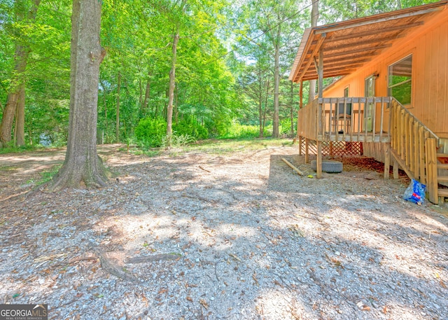 view of yard featuring a deck