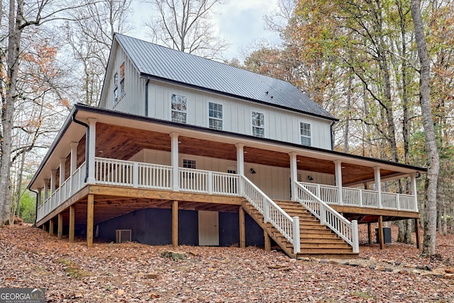 back of house featuring cooling unit