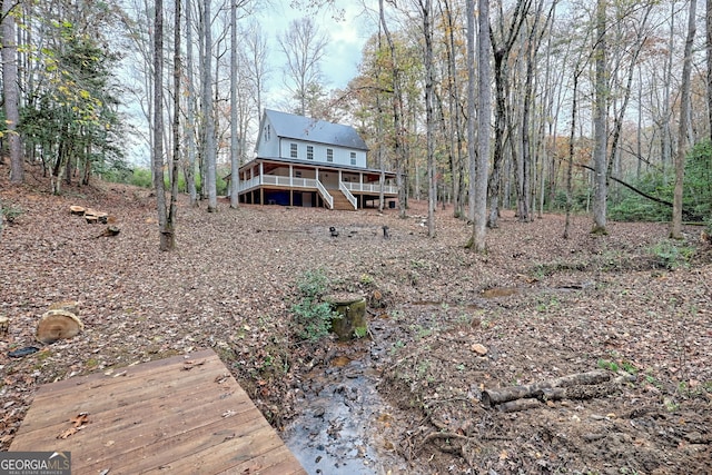 rear view of house with a deck