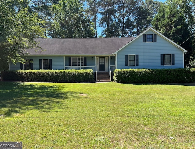 view of front of house with a front lawn and a porch