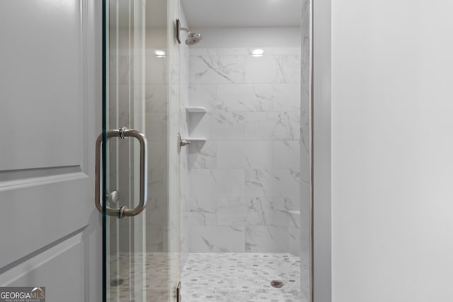 bathroom with an enclosed shower