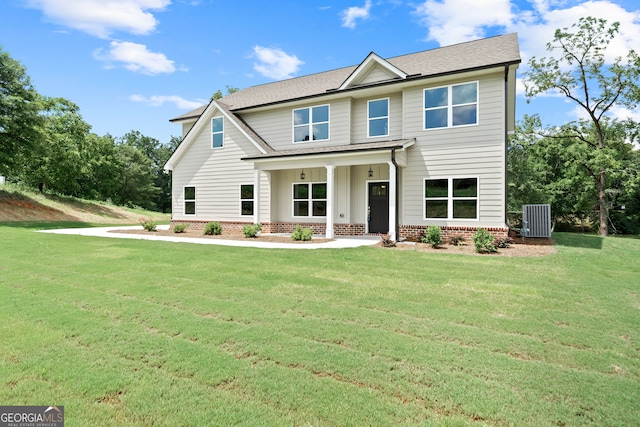 craftsman-style house with central AC unit and a front yard