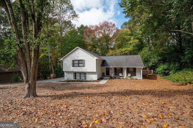 split level home featuring a porch