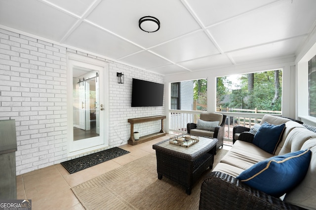 sunroom featuring coffered ceiling