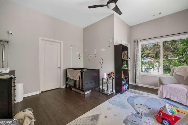 bedroom featuring ceiling fan and dark hardwood / wood-style floors