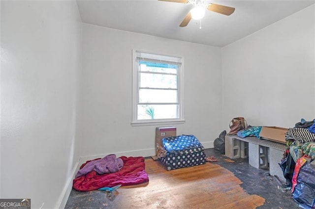 recreation room featuring wood-type flooring and ceiling fan