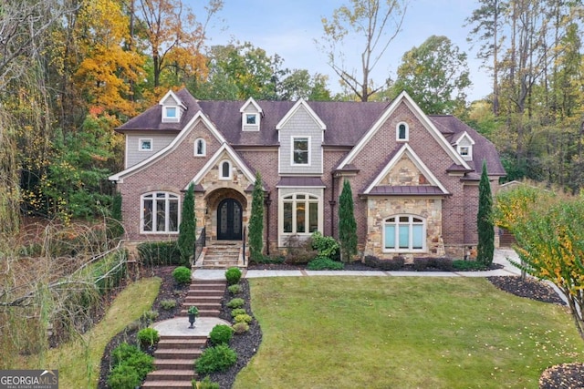 view of front of home with a front lawn