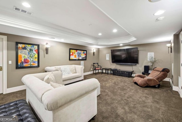 carpeted living room featuring crown molding and a tray ceiling