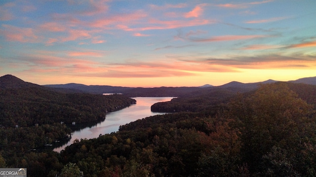 property view of mountains featuring a water view