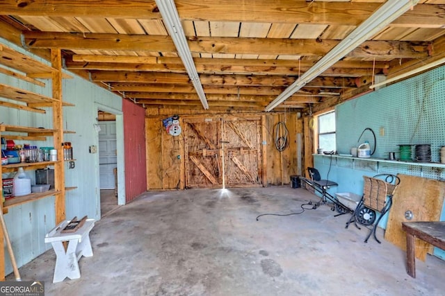 misc room with concrete floors