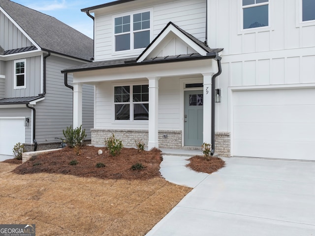 view of front of house featuring a garage and covered porch