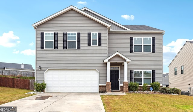 front facade with a garage and a front lawn