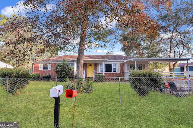 ranch-style home featuring a front lawn