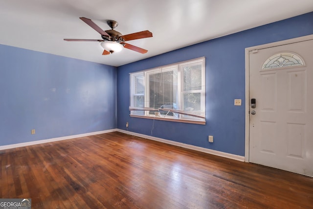 foyer featuring dark hardwood / wood-style flooring and ceiling fan