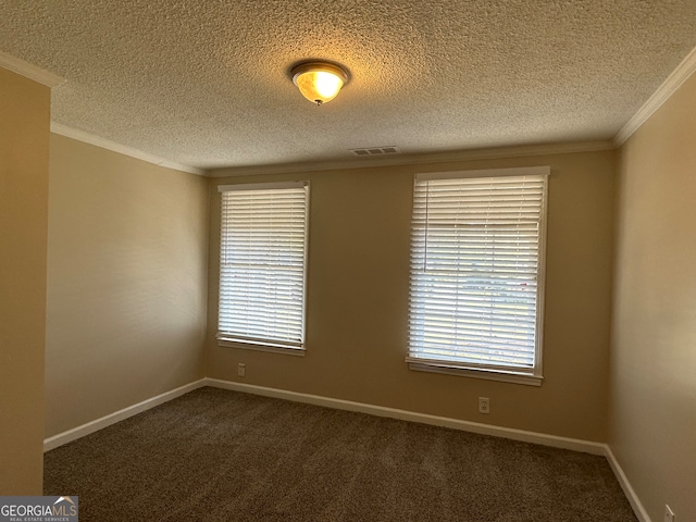 unfurnished room with ornamental molding, dark colored carpet, and a textured ceiling