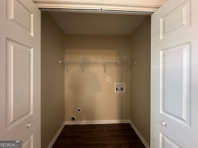 laundry room featuring dark wood-type flooring, washer hookup, and hookup for an electric dryer