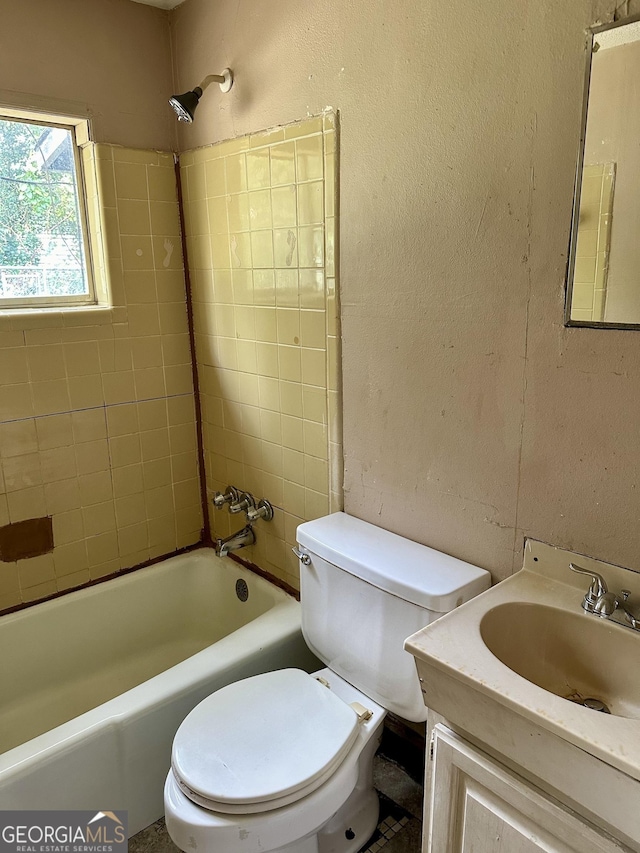 2155 Ferguson St, Macon, GA 31204 - full bath with toilet, bathtub / shower combination, vanity, and a textured wall