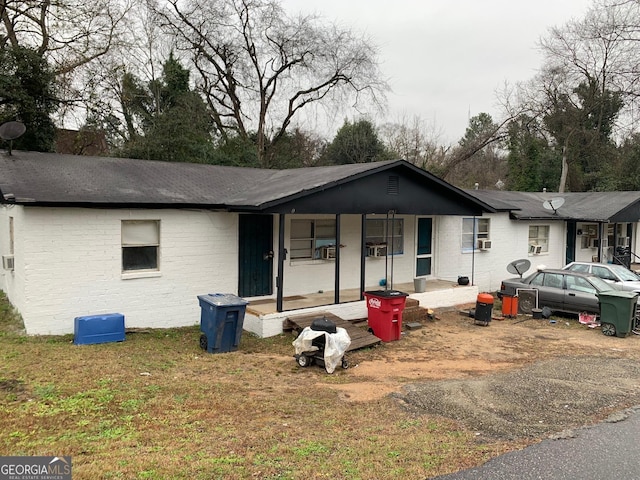 2155 Ferguson St, Macon, GA 31204 - ranch-style home featuring a porch and brick siding