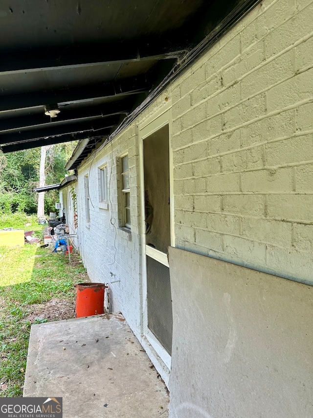 view of home's exterior with a patio area