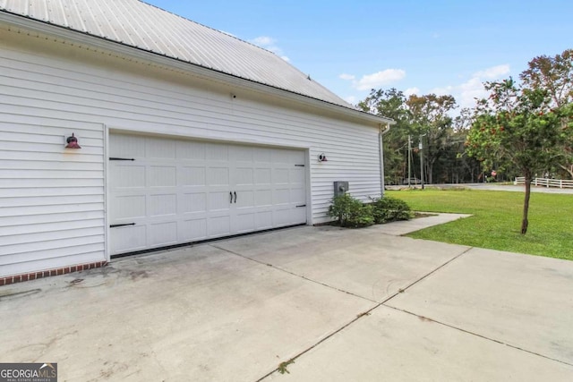 garage with a yard