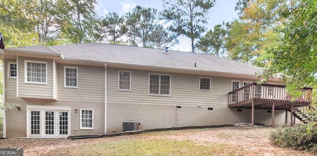 back of property featuring french doors, roof with shingles, stairway, central AC, and a wooden deck