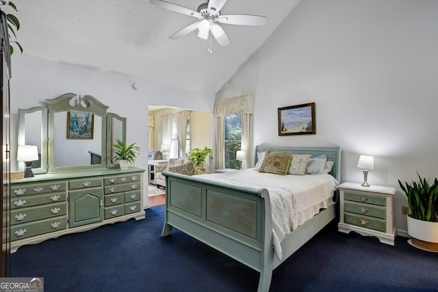 14 Rivendell Way, Hayesville, NC 28904 - bedroom featuring dark carpet, high vaulted ceiling, and ceiling fan