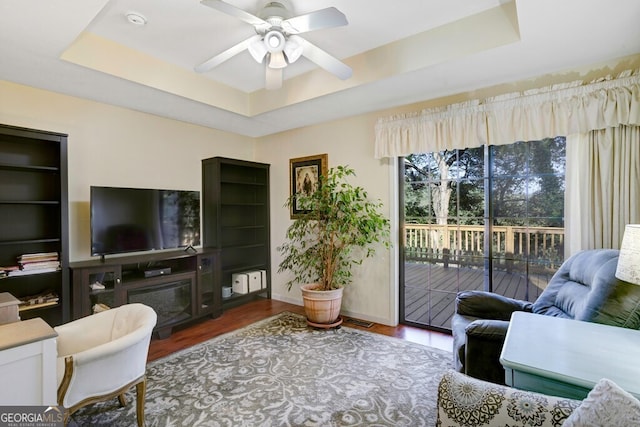 14 Rivendell Way, Hayesville, NC 28904 - living room with a tray ceiling, wood finished floors, and ceiling fan