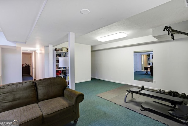 exercise room featuring dark carpet