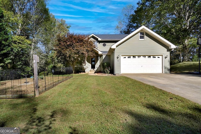 view of front of home with a garage and a front yard