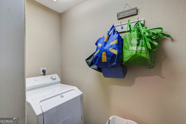 washroom featuring washer / dryer