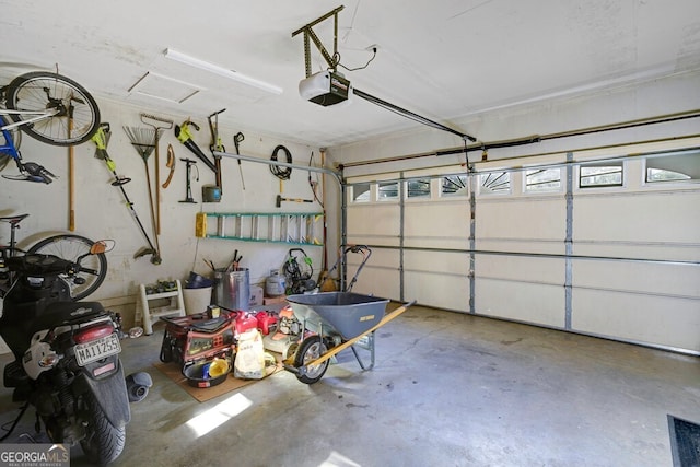 garage featuring a garage door opener