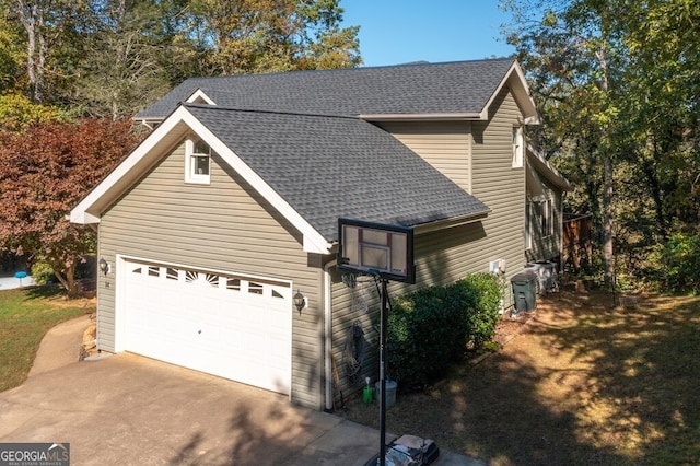 14 Rivendell Way, Hayesville, NC 28904 - view of home's exterior with concrete driveway, roof with shingles, and an attached garage