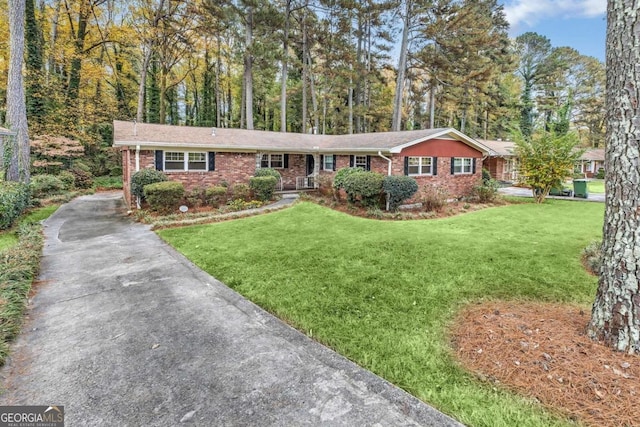 ranch-style house with a front yard