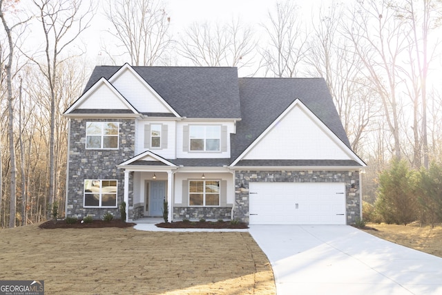 craftsman-style house with a garage and covered porch