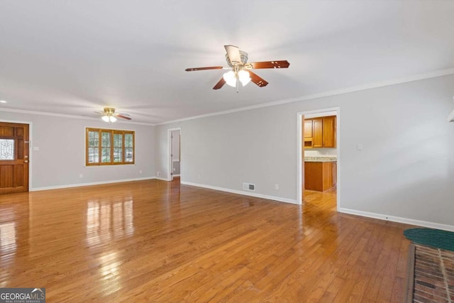 unfurnished living room with ornamental molding, ceiling fan, and light hardwood / wood-style floors